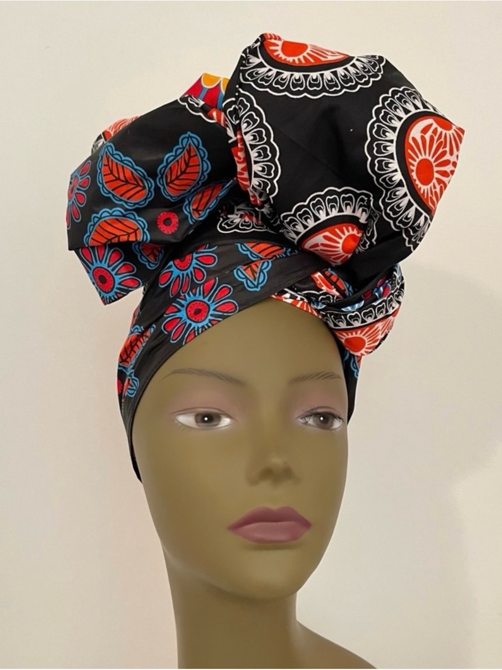 Black African Print Headwrap with Orange and Blue Floral Accents